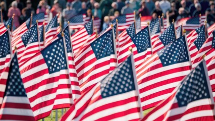 Rows of American flags waving in the breeze during a patriotic festival or national holiday Memorial day.