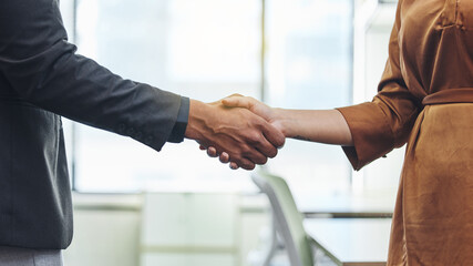 Handshake, agreement and deal with business people in office for meeting, contract and opportunity....