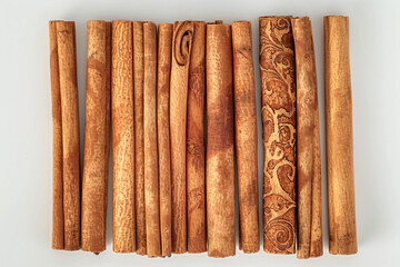 a bunch of cinnamon sticks are arranged on a table