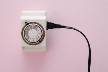 Electrical outlet timer and power cord