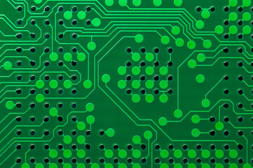 macro photo of green printed circuit board with BGA pads