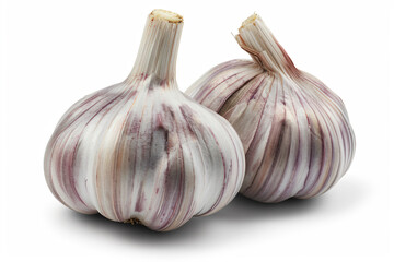 Fototapeta premium two garlic bulbs on a white surface