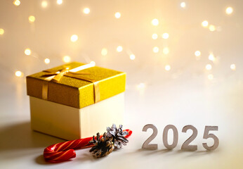 background for new year or christmas 2025 with numbers 2025 and glowing glowing bokeh lights in the...
