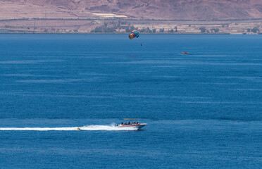 Excursion pleasure motorboat on the Red Sea near Eilat - famous tourist resort and recreational...