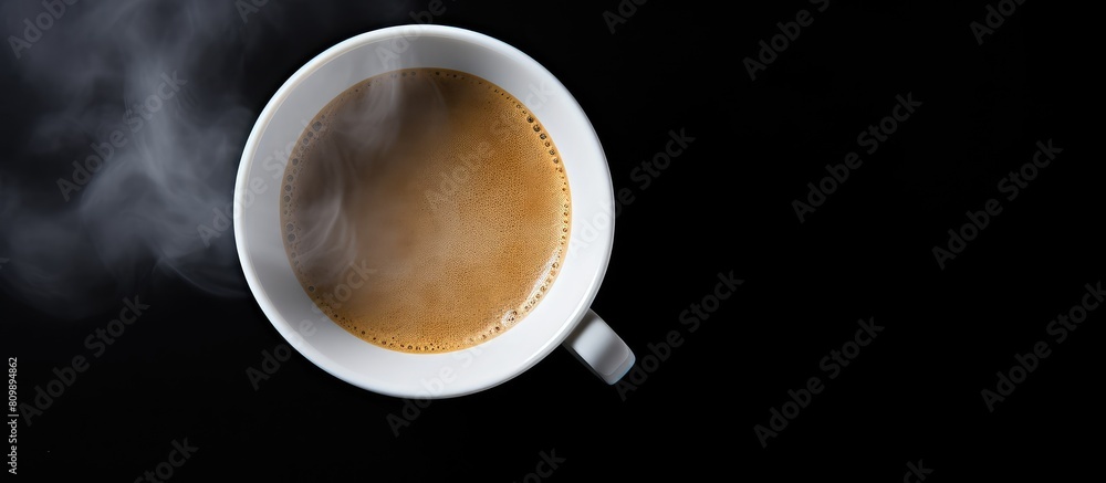 Aufkleber a top down perspective of a steaming cup of black espresso coffee placed on a white background creat