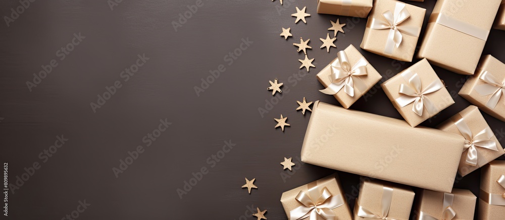 Poster Craft paper boxes top view on a Christmas background with a right sided copy space image