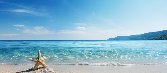 A picturesque image with a sea inspired theme a seastar and a striped sundress against a backdrop of a serene blue beach setting accompanied by travel accessories Perfect for a summer copy space imag