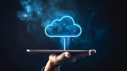 Person holding a tablet with a glowing cloud symbol above it, representing hand thumbs up sign on a dark background