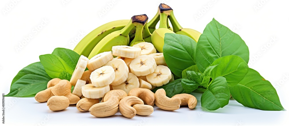 Poster white background with cashew nuts and a green leaf copy space image