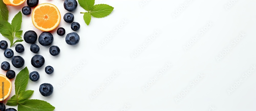 Aufkleber Top view of apricot blueberries and mint leaves arranged on a white background creating a refreshing and vibrant copy space image Ideal for food backgrounds health conscious individuals superfood ent