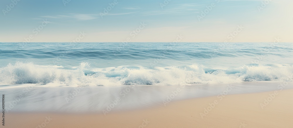 Poster a close up image of the sea coast showcasing the texture and background of the sand and water provid