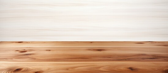 Naklejka premium A brown wooden tabletop is situated on a white background with plenty of space for images. Creative banner. Copyspace image