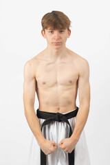 A Shirtless Teenage Karate Boy