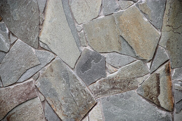 Natural stone wall background or texture