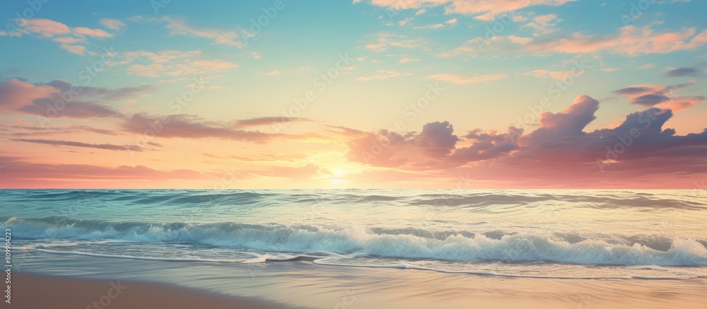 Poster the sandy beach under a beautiful sunset sky provides a perfect setting with ample copy space for yo