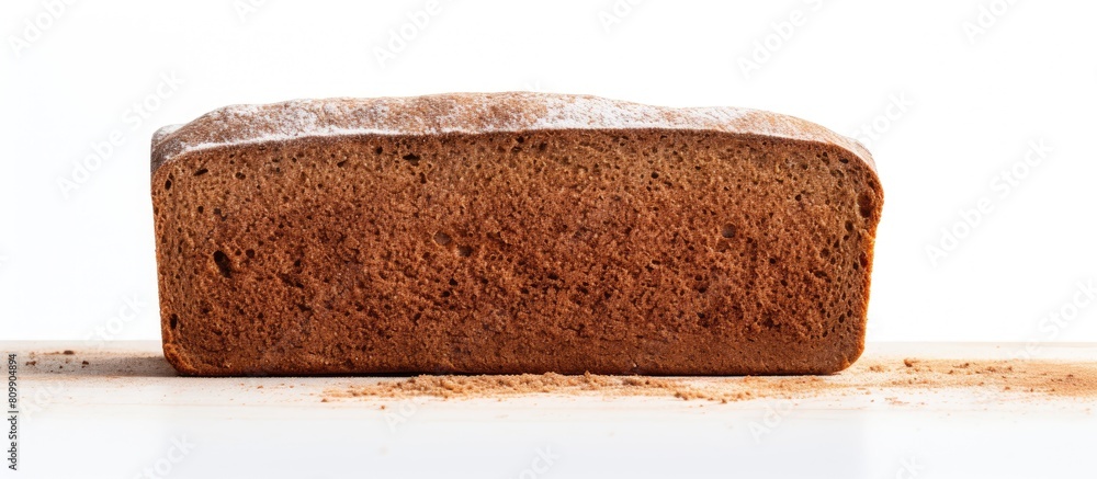 Poster a copy space image of a rye flour bread brick with spices placed on a white background