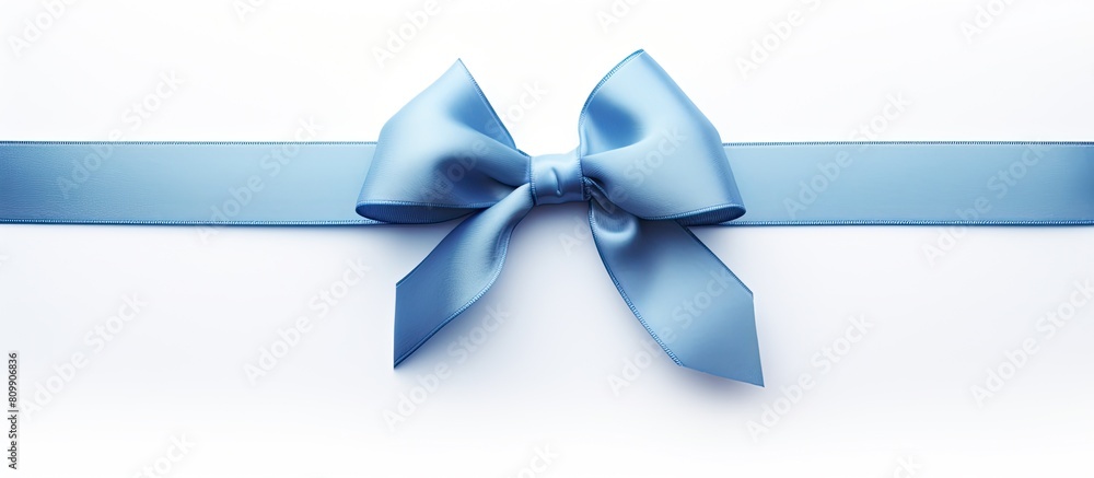 Poster a blue gift ribbon with a parallel ribbon forming a bow on a white background the image has copy spa