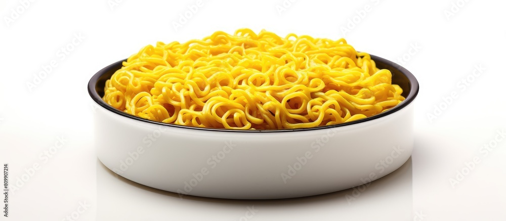 Aufkleber A yellow pan with instant noodles is featured in an isolated image with a white background and copy space