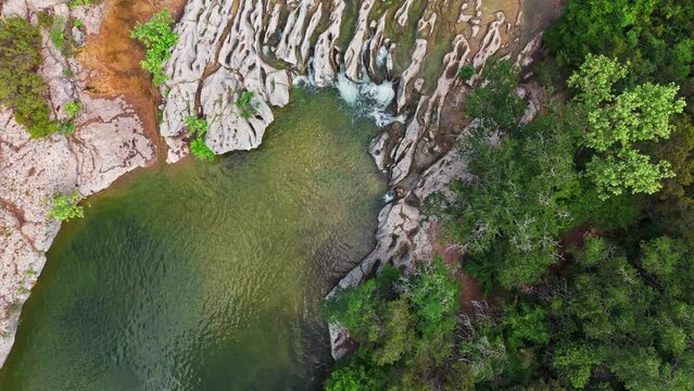 Scenic aerial view of Sculpture Falls via Barton Creek Greenbelt Trail in Austin Texas at summer