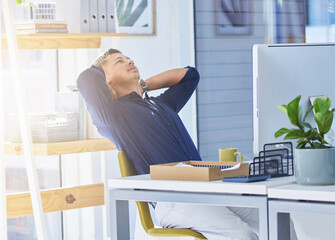 Office, relax and happy businessman at computer for inspiration, rest and advisor stretching at...