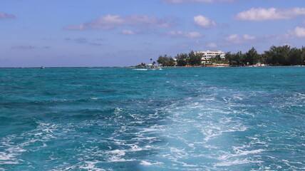 grand cayman, cayman islands from the caribbean sea tropical island vibes  pristine blue turquoise...