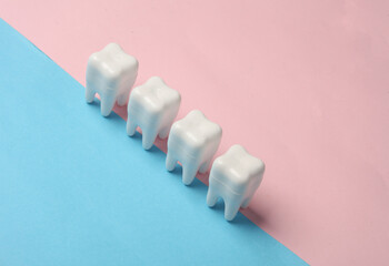 White teeth Models on pink blue background.