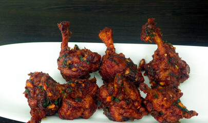 Chicken lollipops a Transformed into Flavorful Bites of Joy, Each Morsel Offering a Symphony of Juiciness and Succulence, A True Delight for the Senses and the Soul