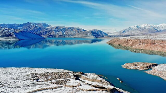 Aerial view of Baisha Lake in Pamir Plateau, Xinjiang, China after snow