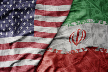 Obraz premium big waving colorful flag of united states of america and national flag of iran on the dollar money background. finance concept.