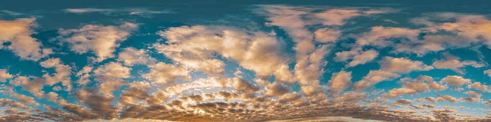 Sunset sky with bright glowing pink Cumulus clouds. Seamless spherical HDR 360 panorama. Full zenith or sky dome in 3D, sky replacement for aerial drone panoramas. Climate and weather change.