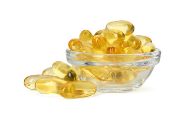 Vitamin capsules in bowl isolated on white. Health supplement
