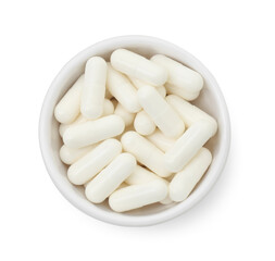 Vitamin capsules in bowl isolated on white, top view. Health supplement