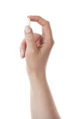Woman holding vitamin capsule on white background, closeup. Health supplement