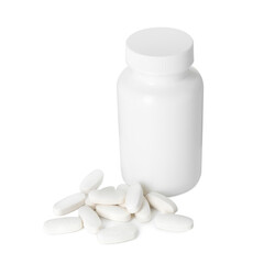 Bottle and pile of vitamin pills isolated on white