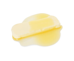 Piece of melting butter isolated on white, above view