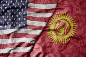 big waving colorful flag of united states of america and national flag of kyrgyzstan on the dollar money background. finance concept . - obrazy, fototapety, plakaty