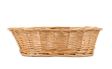 Obraz premium One empty wicker bread basket isolated on white