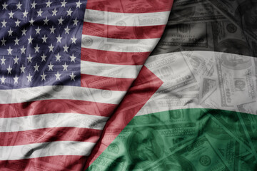 big waving colorful flag of united states of america and national flag of palestine on the dollar money background. finance concept.