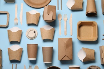 Flat lay composition with eco friendly food packagings on light blue background