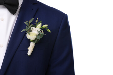 Groom with boutonniere on white background, closeup. Wedding accessory - obrazy, fototapety, plakaty