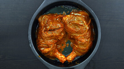 Chicken pieces marinated in curd, spice and herb mixture and oven-fried. Where juicy slow-roasted. So that I get the fragrance of tandoori chicken