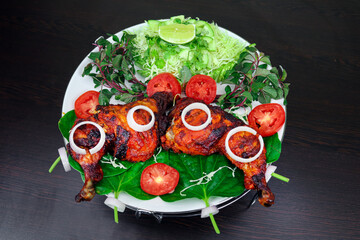 Chicken pieces marinated in curd, spice and herb mixture and oven-fried. Where juicy slow-roasted. So that I get the fragrance of tandoori chicken