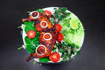 Chicken pieces marinated in curd, spice and herb mixture and oven-fried. Where juicy slow-roasted....