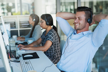 Call center, break and man at computer with customer service and crm work. Conversation, smile and...
