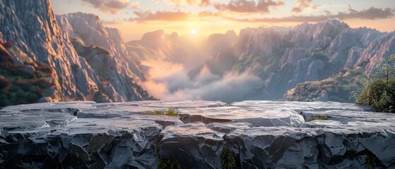 Empty stone tabletop with a vibrant sunrise over misty mountain peaks, ideal for atmospheric product setups