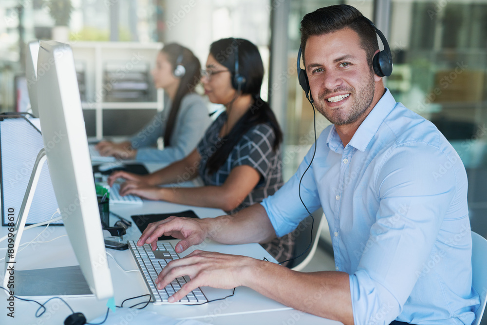 Aufkleber Call center, telemarketing and portrait of man at computer with customer service and crm. Conversation, smile and phone consultant at coworking office with headset and operator with advice at desk