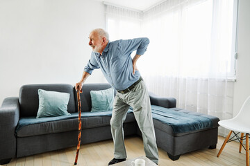 back painbackpain walking stick cane senior mature elderly heath ache backache elderly painful...