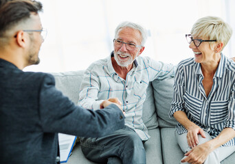 handshake senior couple investment business finance hand agent meeting agreement planning home