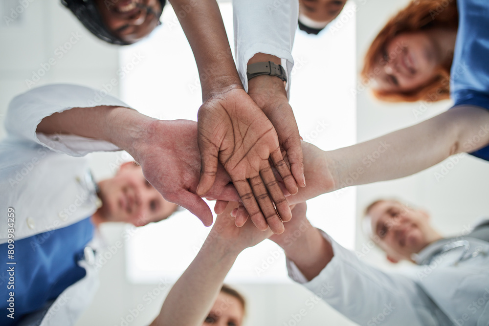 Canvas Prints People, hands together and below with medical team for meeting, unity or motivation at hospital. Low angle or closeup of group piling or touching in collaboration, solidarity or mission at clinic