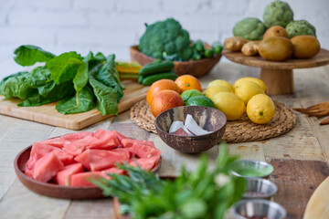 Array of Fresh Fruits and Vegetables on a Rustic Wooden Table, Ideal for Healthy Eating and Cooking